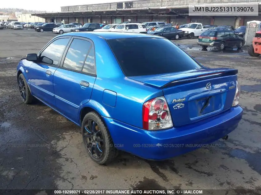 2003 Mazda Protege VIN: JM1BJ225131139076 Lot: 19298071