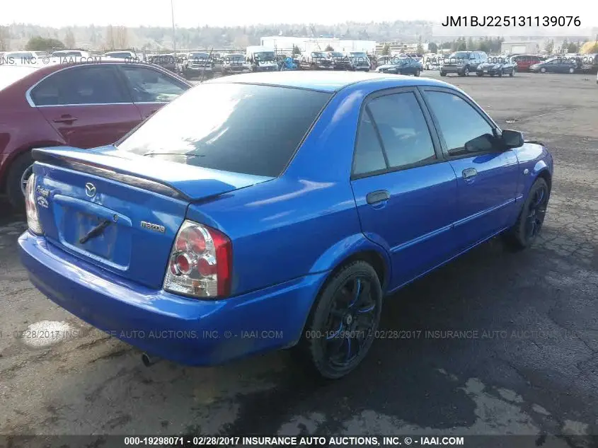 2003 Mazda Protege VIN: JM1BJ225131139076 Lot: 19298071