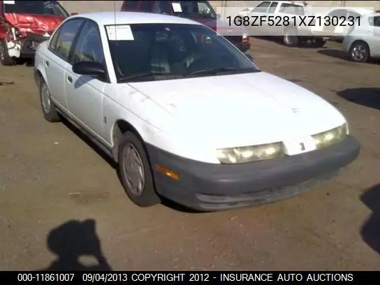 1999 Saturn Sl VIN: 1G8ZF5281XZ130231 Lot: 11861007