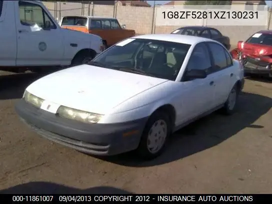 1999 Saturn Sl VIN: 1G8ZF5281XZ130231 Lot: 11861007