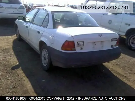 1999 Saturn Sl VIN: 1G8ZF5281XZ130231 Lot: 11861007