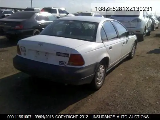 1999 Saturn Sl VIN: 1G8ZF5281XZ130231 Lot: 11861007