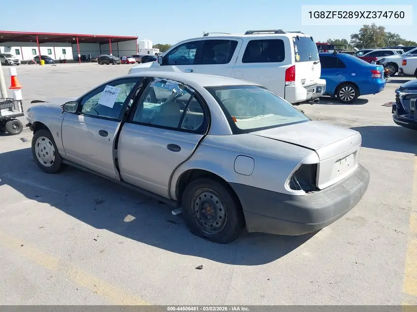 1999 Saturn Sl VIN: 1G8ZF5289XZ374760 Lot: 44506481